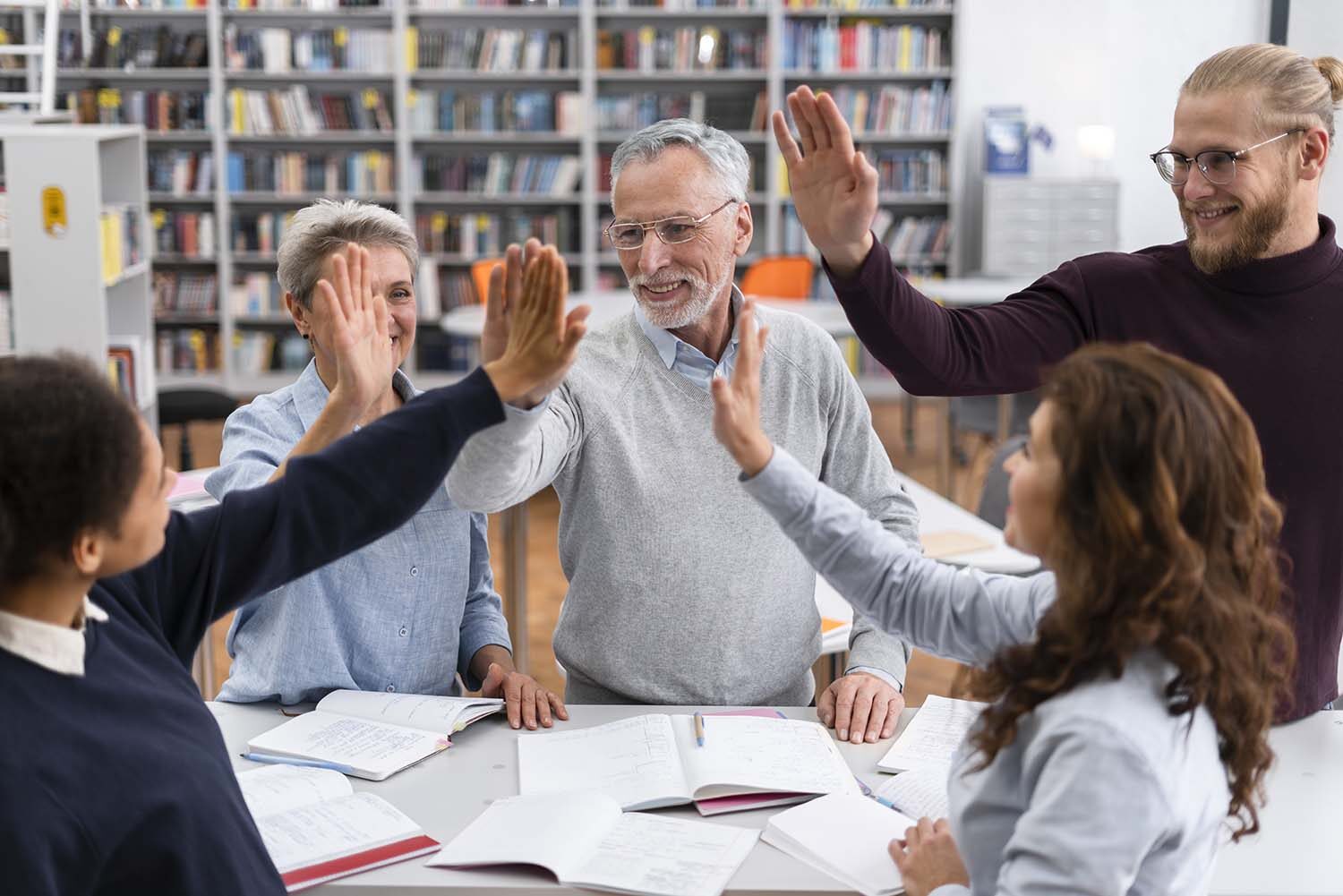 small_people-high-five-library-close-up